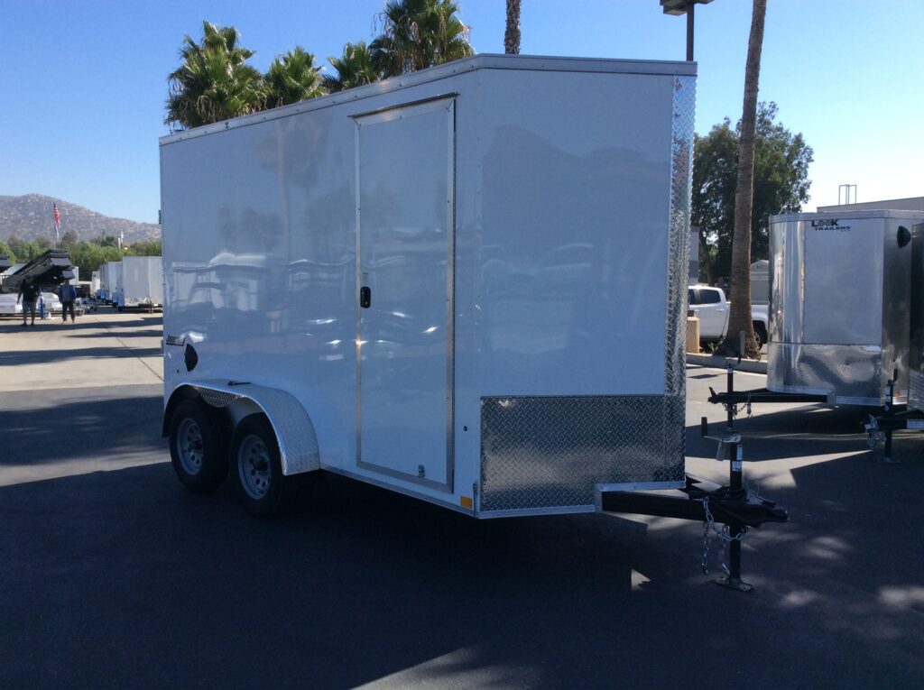 Pace American Journey SE enclosed 6x12' cargo trailer that is one of the previous trailers purchased to meet this landscape company's hauling needs. 